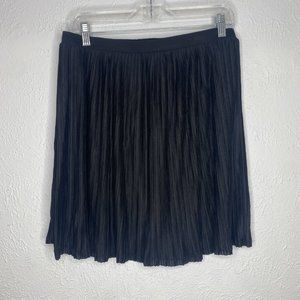 Xhilaration, NWOT, black accordian pleat knee length skirt  junior size Large.